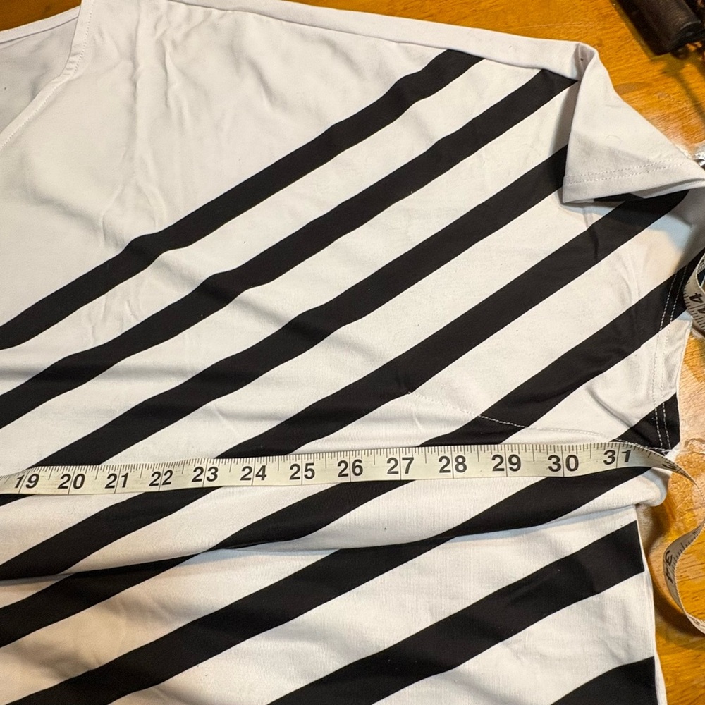 an Elizabeth & Clarke StainTech striped tunic with an asymmetric hem 1x - Picture 5 of 8